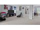 Spacious carpeted bedroom with a view into an adjacent living area, perfect for a Gathering at 1301 Torrey Pines Ct, Mebane, NC 27302