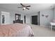 Bedroom with a large window, neutral walls, and a dresser at 1301 Torrey Pines Ct, Mebane, NC 27302