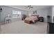 Bedroom with a large window and a comfortable bed, offering a serene and inviting space at 1301 Torrey Pines Ct, Mebane, NC 27302