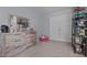 Calm bedroom featuring a natural wood dresser and plenty of storage space for a peaceful retreat at 1301 Torrey Pines Ct, Mebane, NC 27302