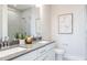 Modern bathroom featuring double sinks, gray counters, and a large shower at 1482 Hasse Ave, Apex, NC 27502