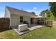 Spacious backyard with a patio area, outdoor furniture, and a generator perfect for entertaining and relaxation at 1574 Dorsett Ln, Creedmoor, NC 27522