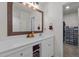 Bathroom featuring a large mirror, vanity with storage, and a separate room for the toilet and shower at 1574 Dorsett Ln, Creedmoor, NC 27522
