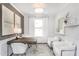 Stylish home office with modern furniture, ample natural light, and elegant decor at 1825 Angelonia Way, Fuquay Varina, NC 27526