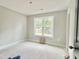 Bedroom with large window providing lots of natural light at 188 Buckaroo Dr, Louisburg, NC 27549
