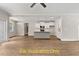Bright, open-concept living space featuring hardwood floors with an island separating the kitchen at 188 Buckaroo Dr, Louisburg, NC 27549