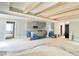 An open concept living area with unfinished kitchen and fireplace at 188 Buckaroo Dr, Louisburg, NC 27549