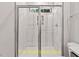 Modern standing shower with white subway tile and a glass door at 188 Buckaroo Dr, Louisburg, NC 27549