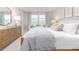 Bright bedroom featuring a large window, plush bedding, and stylish decor at 1901 Hinesley Dr, Durham, NC 27703