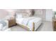 Bright bedroom featuring a large window, plush bedding, and stylish decor at 1901 Hinesley Dr, Durham, NC 27703