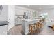 Open kitchen layout featuring granite counters, stainless appliances, and a breakfast bar at 1901 Hinesley Dr, Durham, NC 27703