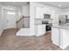 A view of a new kitchen, dining area and staircase at 1903 Hinesley Dr, Durham, NC 27703