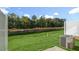 Flat, grassy backyard space with privacy fence at 1905 Hinesley Dr, Durham, NC 27703