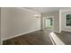 Dining area with hardwood floors, sliding glass doors, and a view of the back yard at 1905 Hinesley Dr, Durham, NC 27703
