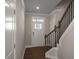 The entry way with wooden floor and staircase at 1905 Hinesley Dr, Durham, NC 27703
