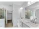 Bathroom featuring double sinks, a glass shower, and modern fixtures at 2021 Clydner Dr, Apex, NC 27523