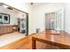 Open dining area with hardwood floors seamlessly connected to the kitchen and other living spaces at 206 N State St, Raleigh, NC 27601