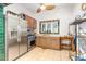 Charming kitchen with stainless steel appliances, tile floors, and a window that provides natural light at 206 N State St, Raleigh, NC 27601