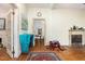 Spacious living room with hardwood floors, fireplace, and abundant natural light at 206 N State St, Raleigh, NC 27601