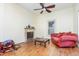 Cozy living room with a fireplace, a comfortable couch, and natural light from the windows at 206 N State St, Raleigh, NC 27601
