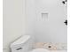 Bathroom with white tile and a tiled shower base at 2205 Tampa Ave, Durham, NC 27705