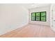 Bedroom with large windows for great natural lighting at 2205 Tampa Ave, Durham, NC 27705
