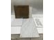 Sample board showcasing brown cabinet door, light tiles, marble pattern, and hexagon backsplash at 260 Meadowbark Bnd # 44, Garner, NC 27529