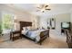 Primary bedroom with hardwood furniture, including a queen sized bed and dresser at 2601 Brookstone Ridge, Raleigh, NC 27613