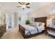 Bedroom with hardwood furniture, including a queen sized bed and dresser at 2601 Brookstone Ridge, Raleigh, NC 27613