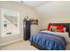 Bedroom with bed and dresser, carpeted floor, and natural light at 2601 Brookstone Ridge, Raleigh, NC 27613
