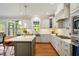 Spacious kitchen with island, and stainless steel appliances, with hardwood floors at 2601 Brookstone Ridge, Raleigh, NC 27613