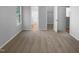 Carpeted bedroom showcasing neutral tones and doorways to the bathroom and walk-in closet at 2747 Michelle Ct, Creedmoor, NC 27522