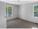 Cozy bedroom offering natural light from two windows and neutral walls at 2747 Michelle Ct, Creedmoor, NC 27522