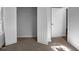 Spacious bedroom featuring an open closet and multiple doors at 2747 Michelle Ct, Creedmoor, NC 27522