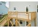 Two-story back deck with stairs and a door that leads into the house at 283 Hopewell Br Ct, Smithfield, NC 27577