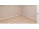 Walk-in closet with carpet and built-in shelving for storage at 283 Hopewell Br Ct, Smithfield, NC 27577