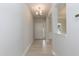 Bright entryway with light wood flooring and a view into the adjacent living spaces at 283 Hopewell Br Ct, Smithfield, NC 27577