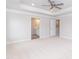 Bright main bedroom with a ceiling fan and a view to an en-suite bathroom and closet at 283 Hopewell Br Ct, Smithfield, NC 27577