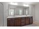 Elegant bathroom boasts double sinks, ample vanity storage, and a clear glass shower at 3008 Dog Rose Dr # 307, Durham, NC 27703