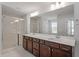 Bathroom features double sinks, generous vanity space and a glass shower at 3008 Dog Rose Dr # 307, Durham, NC 27703