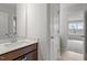 Bathroom with tile floors, neutral walls, and a quartz countertop at 3008 Dog Rose Dr # 307, Durham, NC 27703