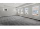 Spacious bedroom with multiple windows and soft carpet flooring for a comfortable retreat at 3008 Dog Rose Dr # 307, Durham, NC 27703