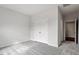 Bedroom with gray carpet, a large closet, and a door at 3008 Dog Rose Dr # 307, Durham, NC 27703