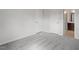 Bedroom with gray carpet and neutral walls and a doorway to a bathroom at 3008 Dog Rose Dr # 307, Durham, NC 27703