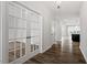 Welcoming foyer with hardwood floors and a view into the open-concept living spaces at 3008 Dog Rose Dr # 307, Durham, NC 27703