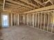 Unfinished interior with wood framing showcasing the layout and structure of the home at 3008 Dog Rose Dr # 307, Durham, NC 27703