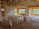 Framed interior view of a new home featuring wood beams, studs, and abundant natural light at 3008 Dog Rose Dr # 307, Durham, NC 27703