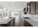 Bright kitchen showcases white countertops, pendant lighting, and modern cabinetry at 3008 Dog Rose Dr # 307, Durham, NC 27703