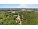 Aerial view of a countryside road surrounded by greenery, farmland and houses at 3899 Warrenton Rd, Henderson, NC 27537