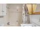 Full bathroom with vanity, toilet, and shower/tub with curtain at 3899 Warrenton Rd, Henderson, NC 27537